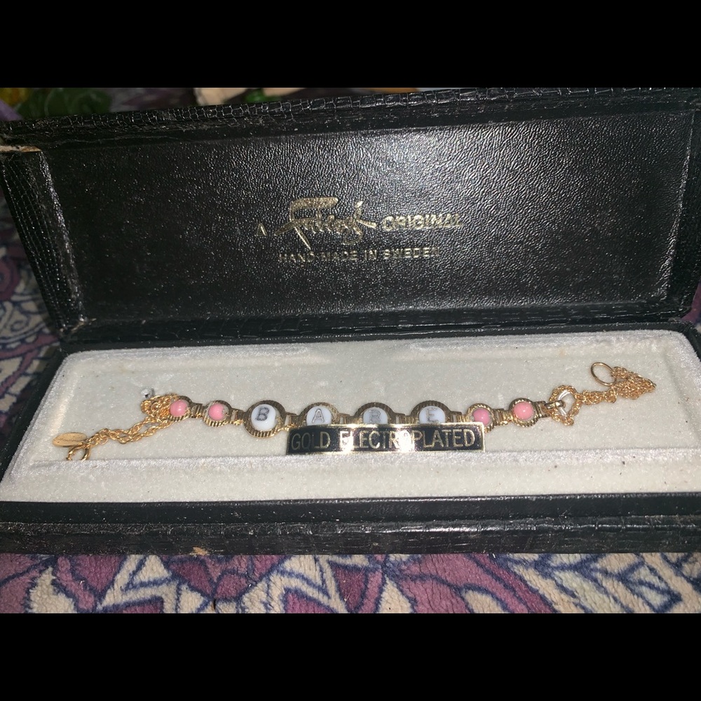 1970s Faberge “Babe” gold electroplated bracelet